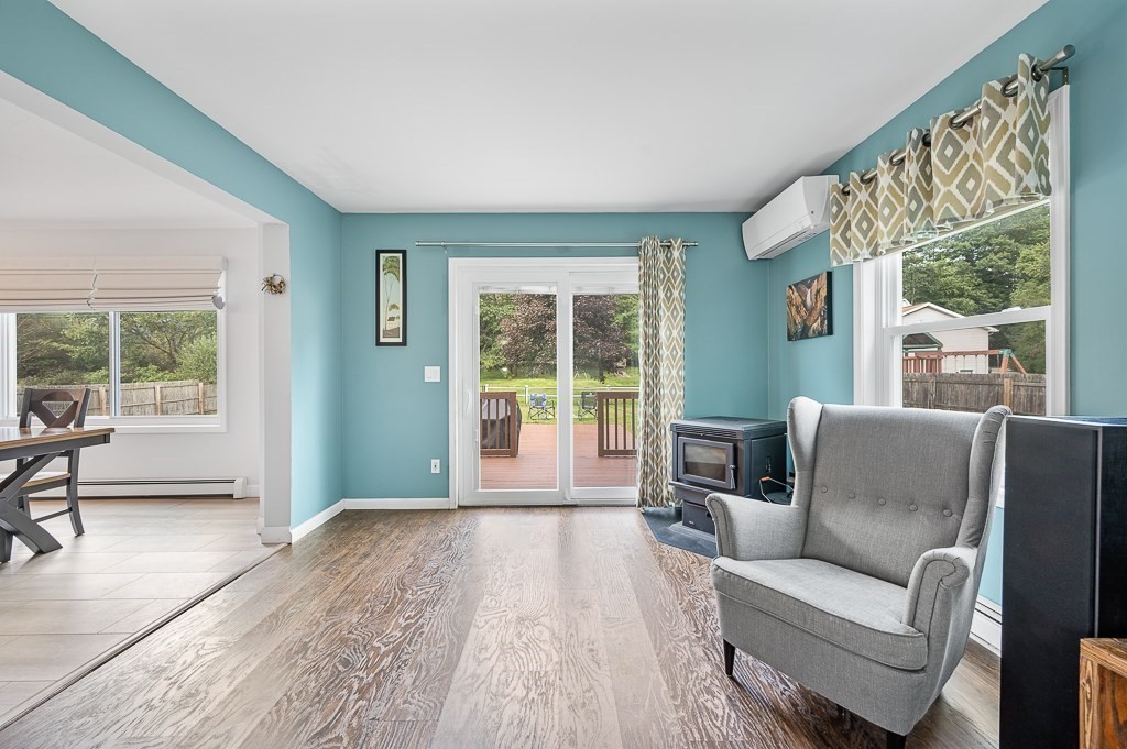 6 Edward Road Dudley, MA 01571 - Photo 12 of 28 a living room with furniture and a large window