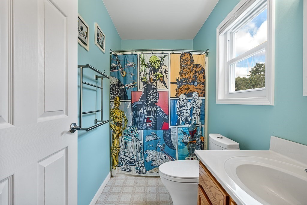 6 Edward Road Dudley, MA 01571 - Photo 22 of 28 a bathroom with a toilet a sink and a shower