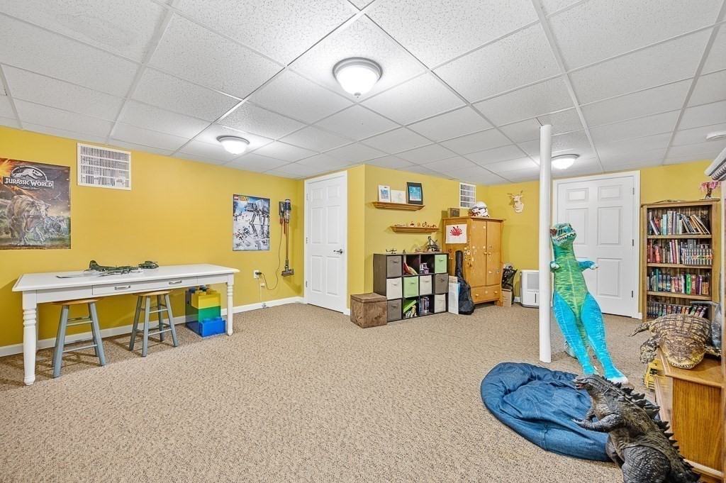 6 Edward Road Dudley, MA 01571 - Photo 23 of 28 a view of a room with gym equipment