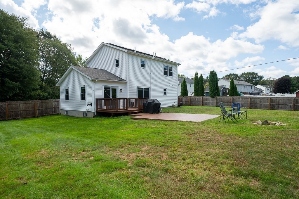 6 Edward Road Dudley, MA 01571 - Photo 27 of 28 a view of a house with backyard and sitting area