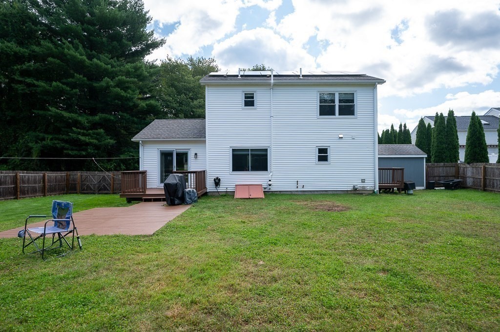 6 Edward Road Dudley, MA 01571 - Photo 28 of 28 a front view of house with yard and seating area
