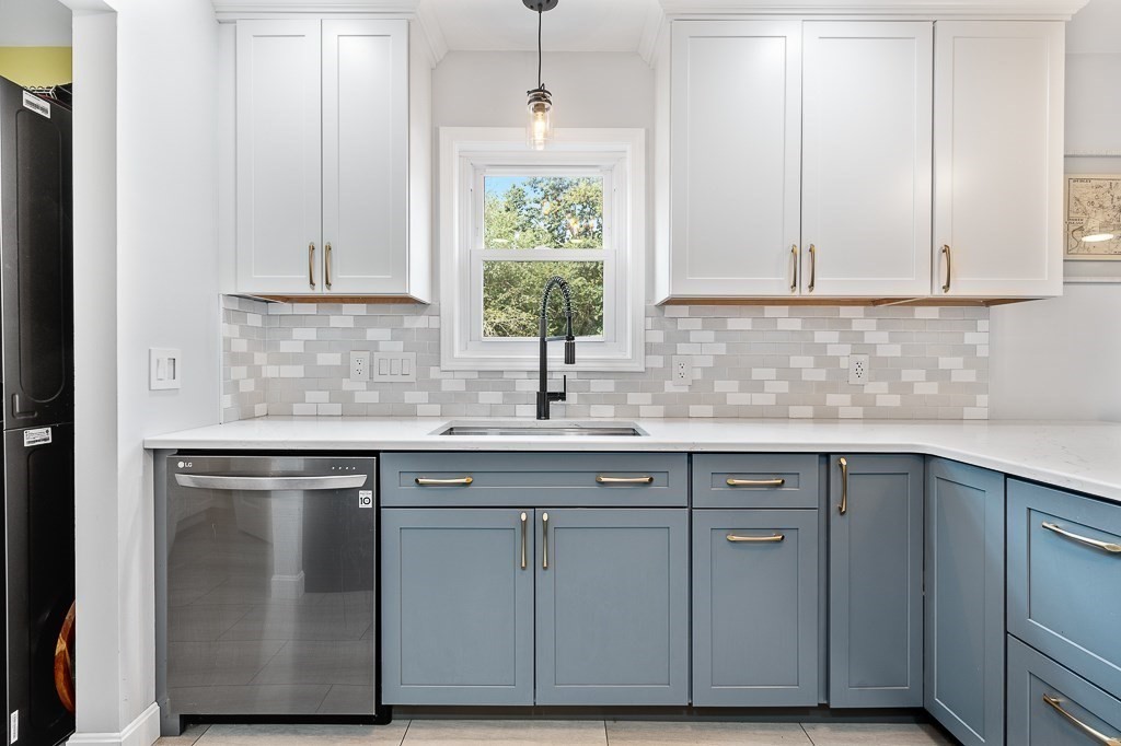 6 Edward Road Dudley, MA 01571 - Photo 6 of 28 a kitchen with cabinets appliances and a sink
