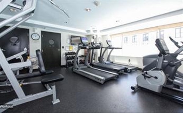 151 Tremont Street, Unit 7B Boston, MA 02111 - Photo 12 of 14 a view of a room with gym equipment