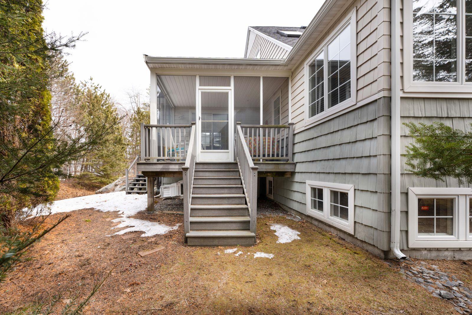 7 Fiddlehead Fern Trail, Unit 31 Brunswick, ME 04011 - Photo 46 of 49 7 FF Screened porch steps