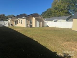 939 Matthews School Road Matthews, NC 28105 - Photo 19 of 21 a view of house with backyard and garden