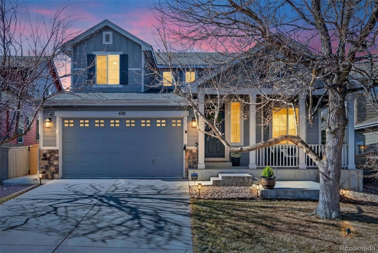 4748 Bluegate Drive Highlands Ranch, CO 80130 - Photo 2 of 49 a front view of house