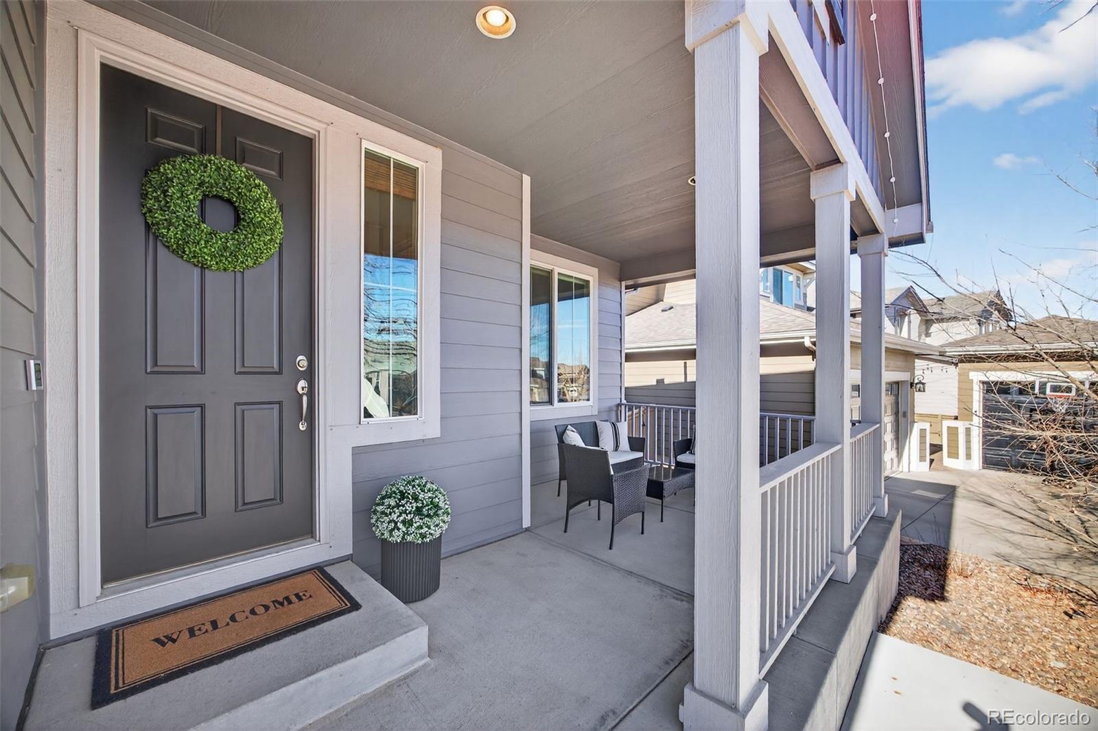 4748 Bluegate Drive Highlands Ranch, CO 80130 - Photo 6 of 49 a view of an entryway with seating area