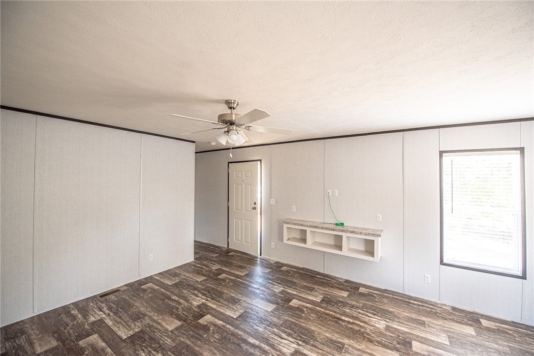 551 Boysenberry Road Somerville, TX 77879 - Photo 23 of 38 a view of a bedroom with a bed and a window