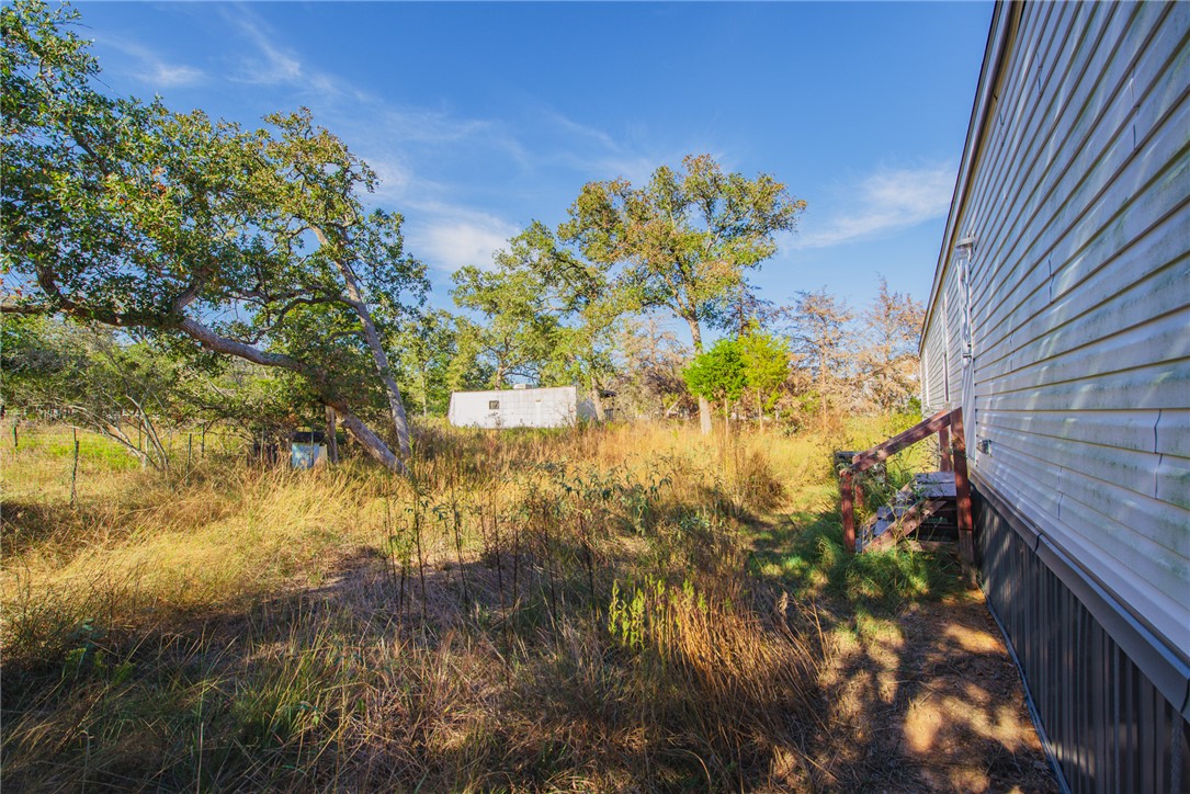 551 Boysenberry Road Somerville, TX 77879 - Photo 30 of 38 a view of a yard