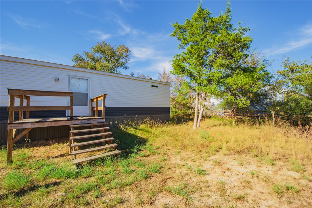 551 Boysenberry Road Somerville, TX 77879 - Photo 31 of 38 a backyard of a house