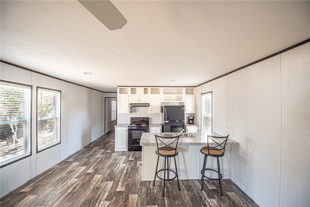 551 Boysenberry Road Somerville, TX 77879 - Photo 5 of 38 a view of a livingroom with furniture window and outside view