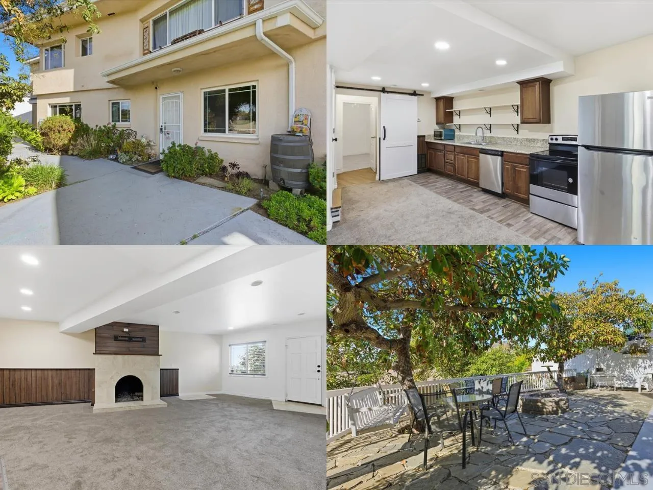 a view of kitchen with stainless steel appliances kitchen island in the center