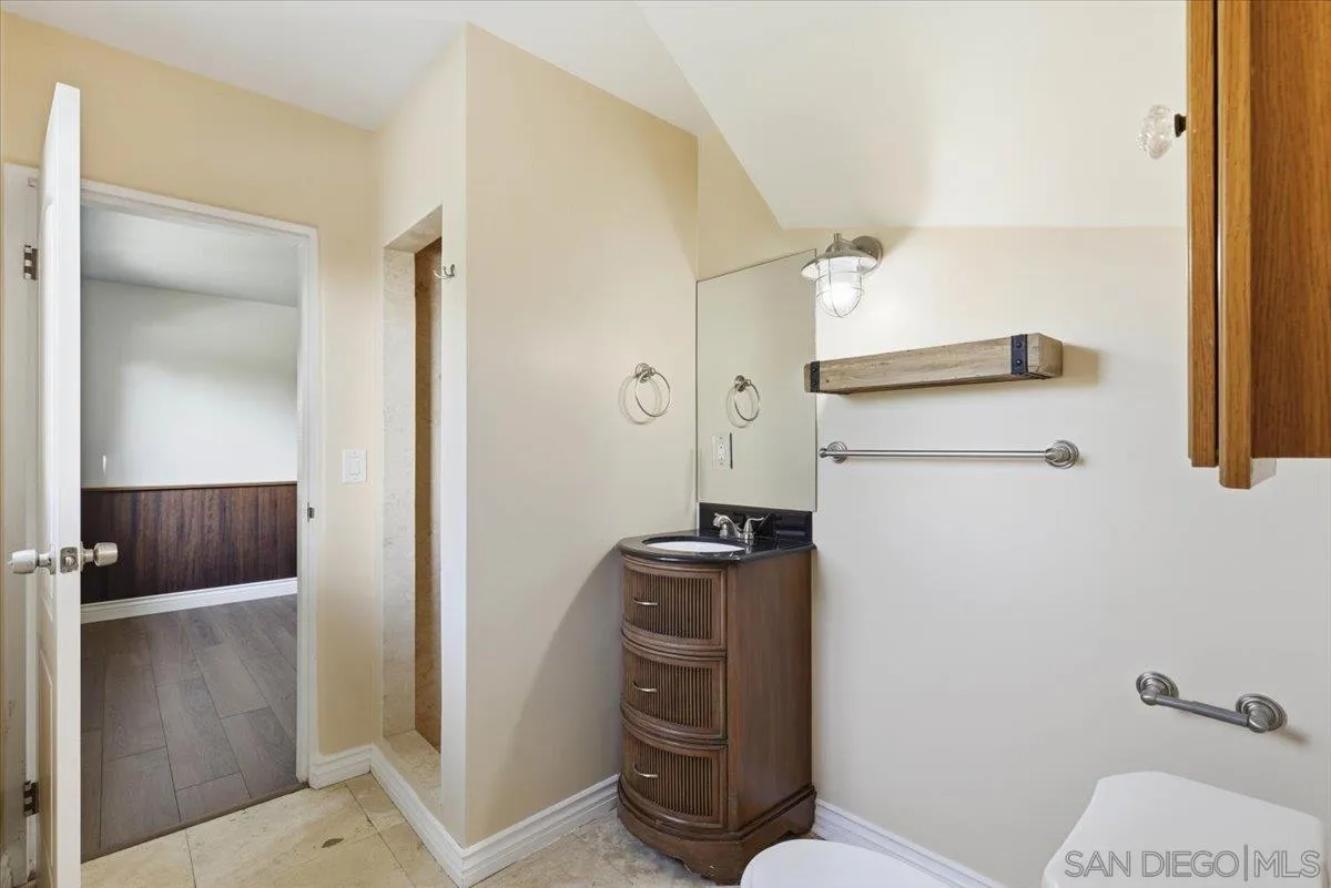 4341 Vista Way, Unit A La Mesa, CA 91941 - Photo 20 of 24 a bathroom with a toilet and a shower