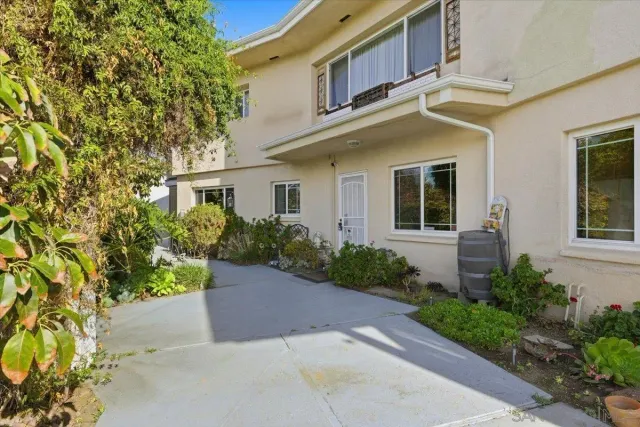 a view of a building with a garden