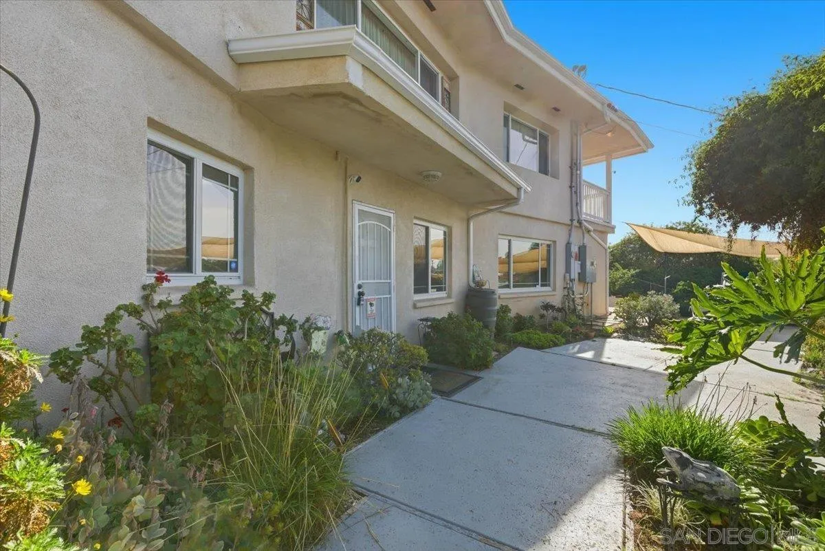 4341 Vista Way, Unit A La Mesa, CA 91941 - Photo 6 of 24 a view of a building with a garden