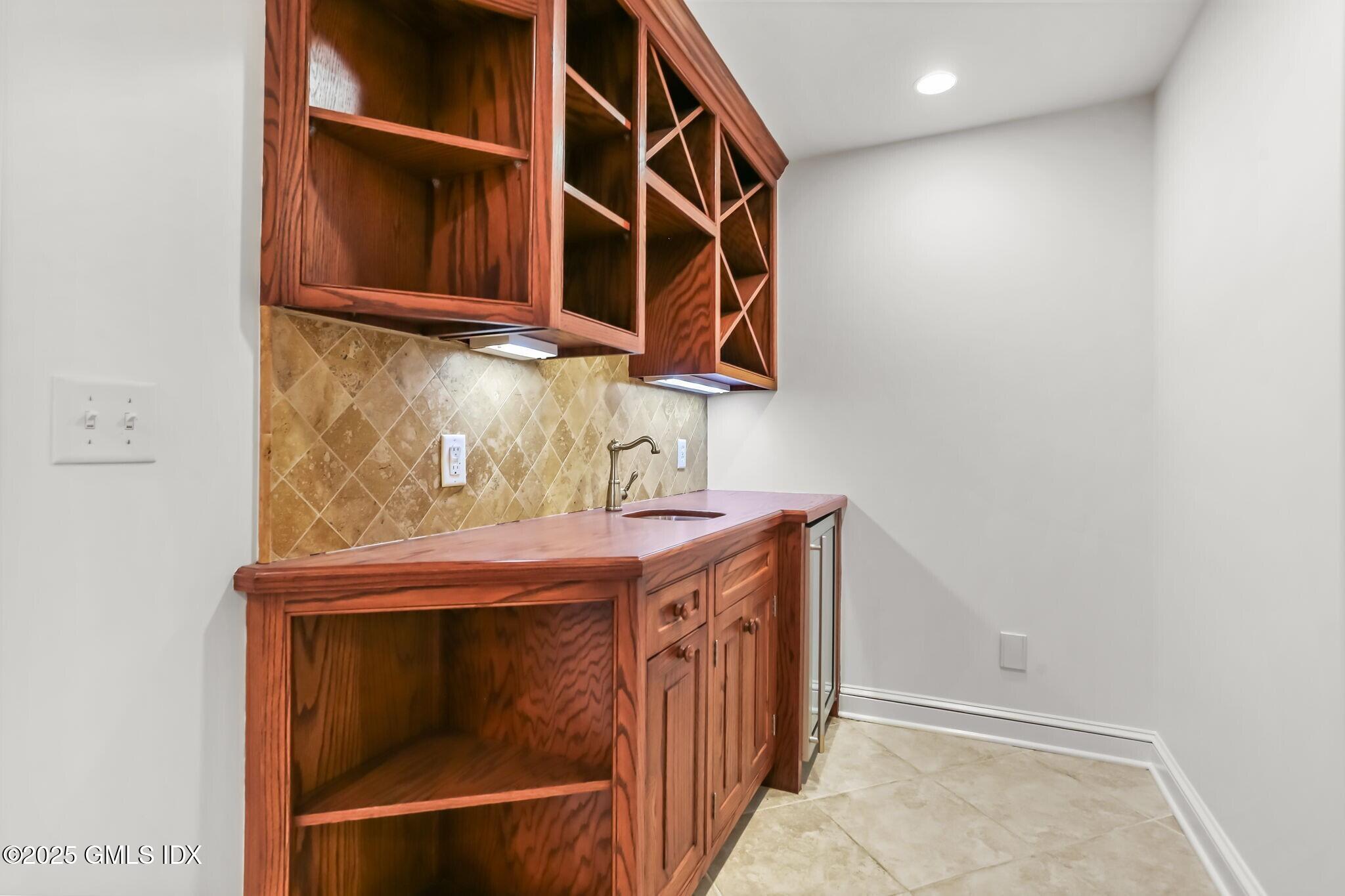 348 Sound Beach Avenue Old Greenwich, CT 06870 - Photo 47 of 61 305 348 Sound Beach Ave. Lower Level Wet