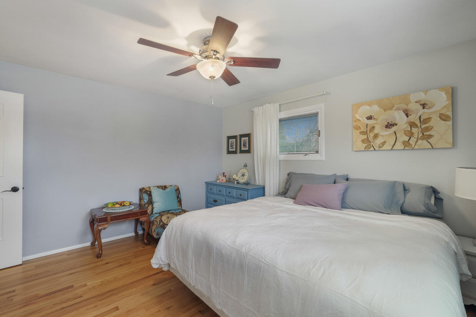 1508 Mayfair Road Champaign, IL 61821 - Photo 20 of 41 a bedroom with a bed and a chandelier