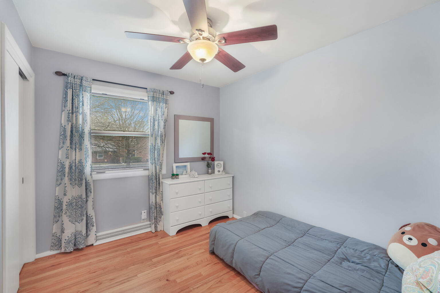 1508 Mayfair Road Champaign, IL 61821 - Photo 21 of 41 a bedroom with a bed and a chandelier