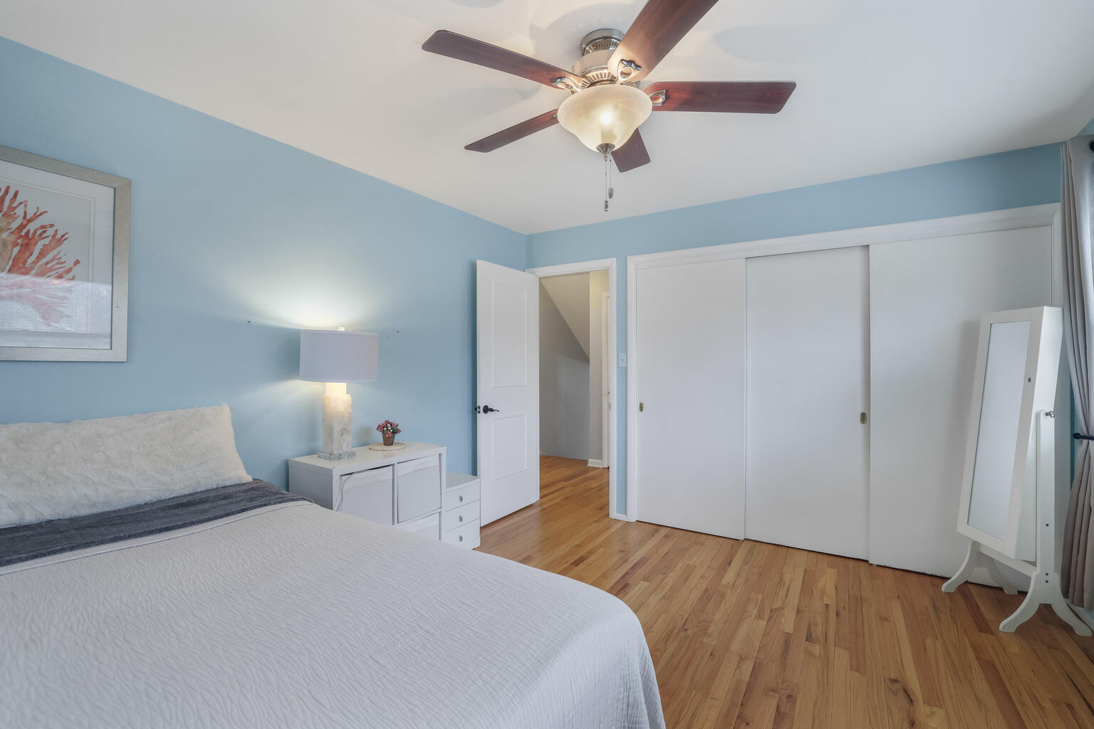 1508 Mayfair Road Champaign, IL 61821 - Photo 24 of 41 a bedroom with a large bed and a ceiling fan