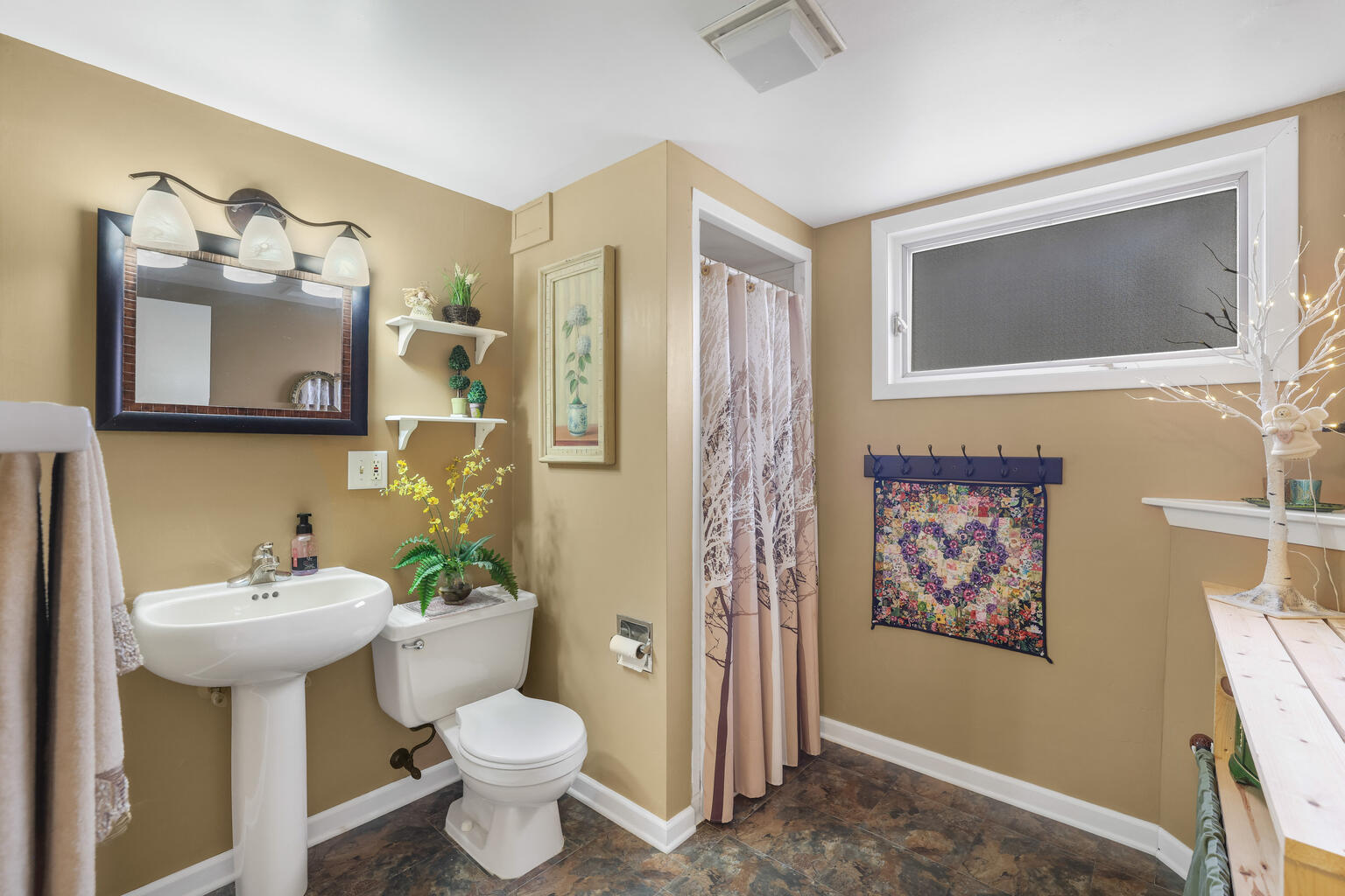 1508 Mayfair Road Champaign, IL 61821 - Photo 29 of 41 a bathroom with a toilet sink and mirror