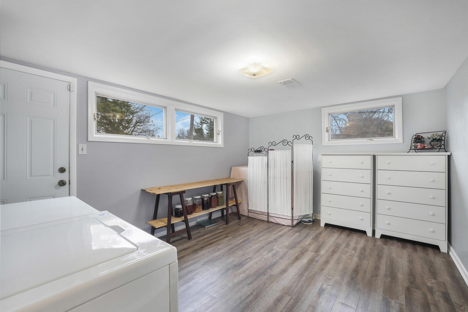1508 Mayfair Road Champaign, IL 61821 - Photo 30 of 41 a living room with furniture and a baby crib
