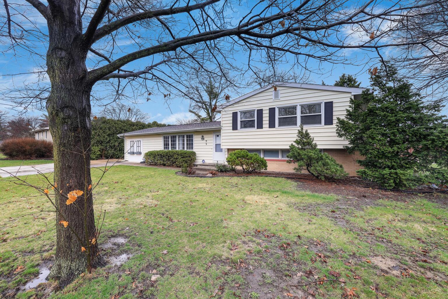 1508 Mayfair Road Champaign, IL 61821 - Photo 3 of 41 a front view of a house with garden