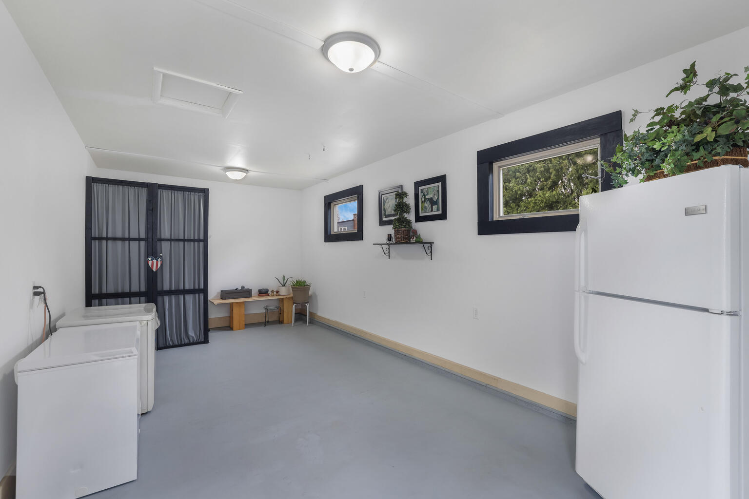 1508 Mayfair Road Champaign, IL 61821 - Photo 32 of 41 a storage room with furniture and a refrigerator