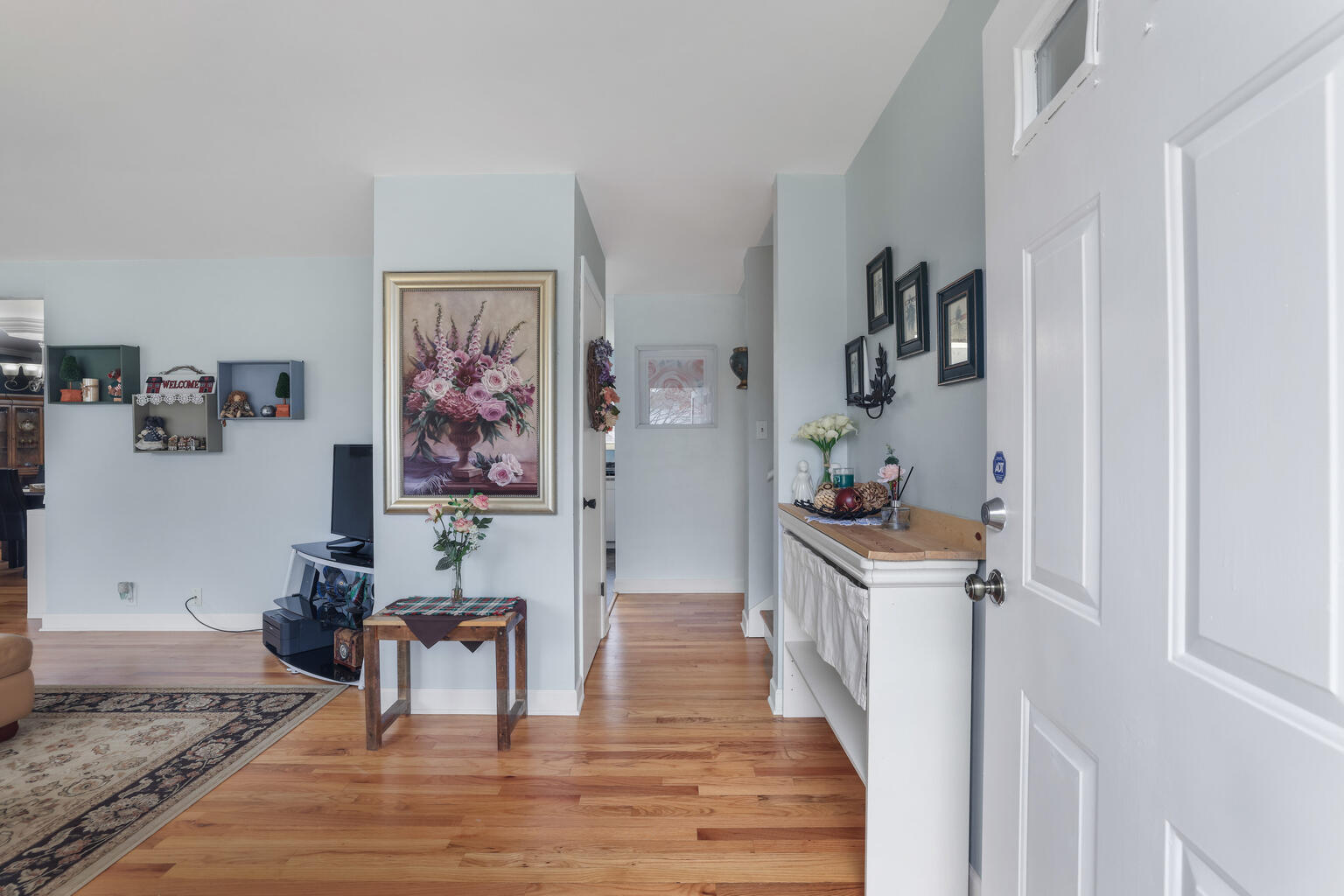1508 Mayfair Road Champaign, IL 61821 - Photo 5 of 41 a living room with furniture and a wooden floor