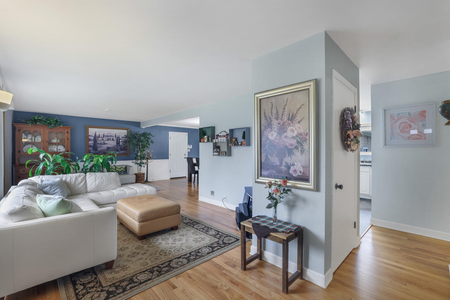 1508 Mayfair Road Champaign, IL 61821 - Photo 7 of 41 a living room with furniture and a potted plant
