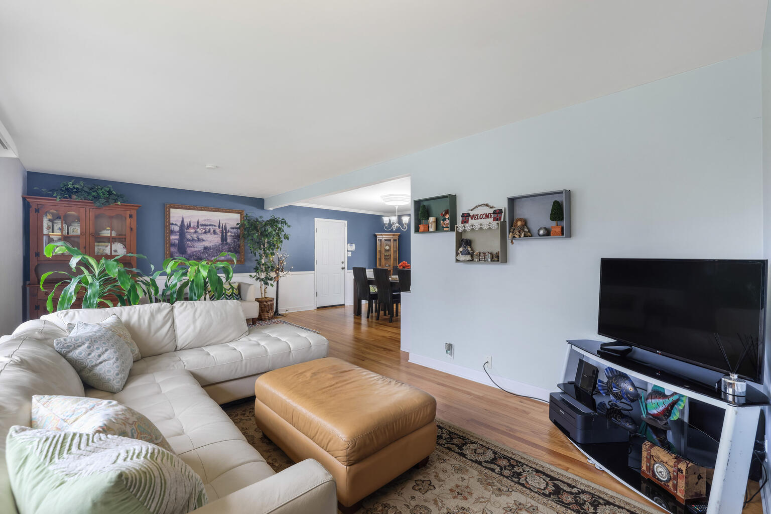 1508 Mayfair Road Champaign, IL 61821 - Photo 8 of 41 a living room with furniture and a flat screen tv