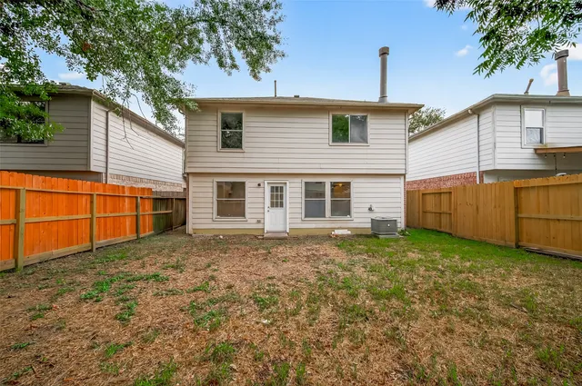 a view of a backyard with blue space
