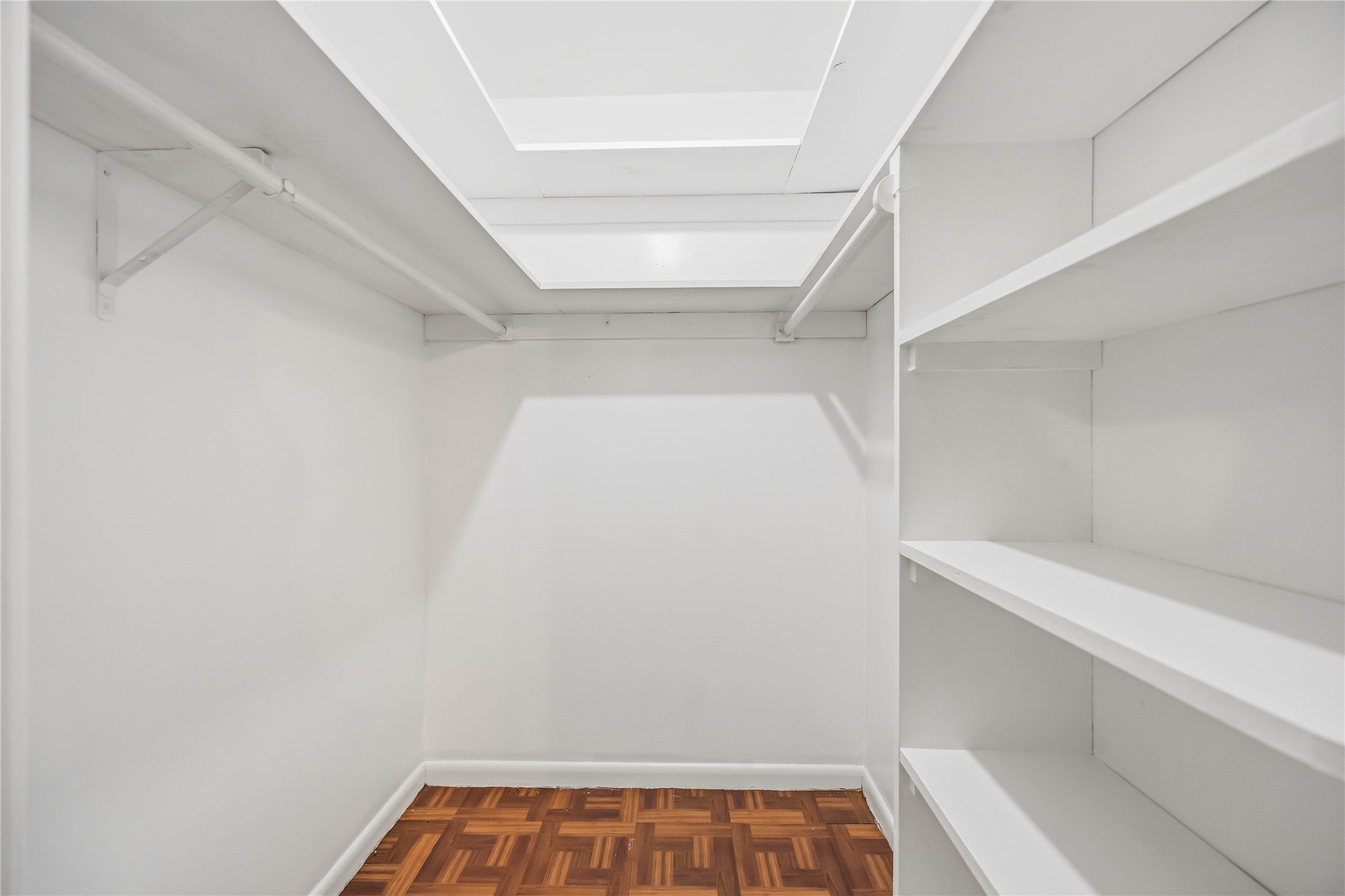 435 Rolling Wood Road Baytown, TX 77520 - Photo 16 of 29 Primary walk-in closet with ample space for his/her clothing and accessories