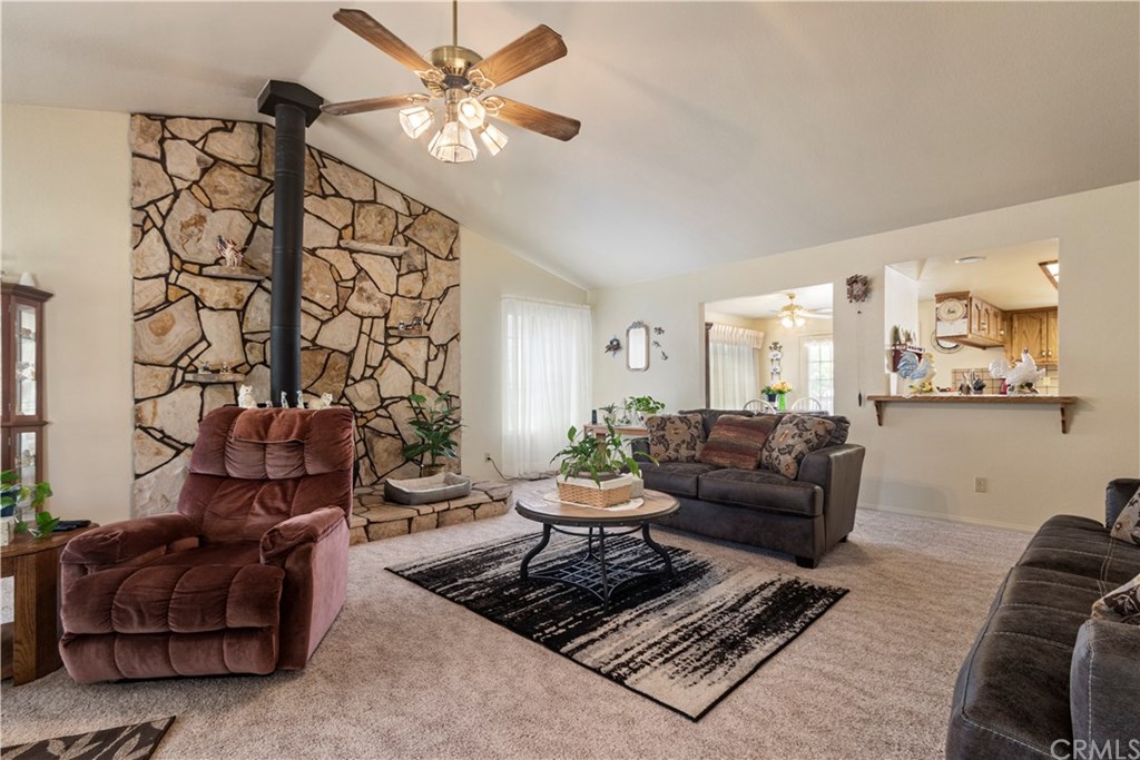 1775 Southfork Place Paso Robles, CA 93446 - Photo 14 of 36 a living room with furniture and a chandelier