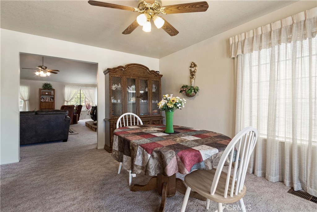 1775 Southfork Place Paso Robles, CA 93446 - Photo 16 of 36 a dining room with furniture and window