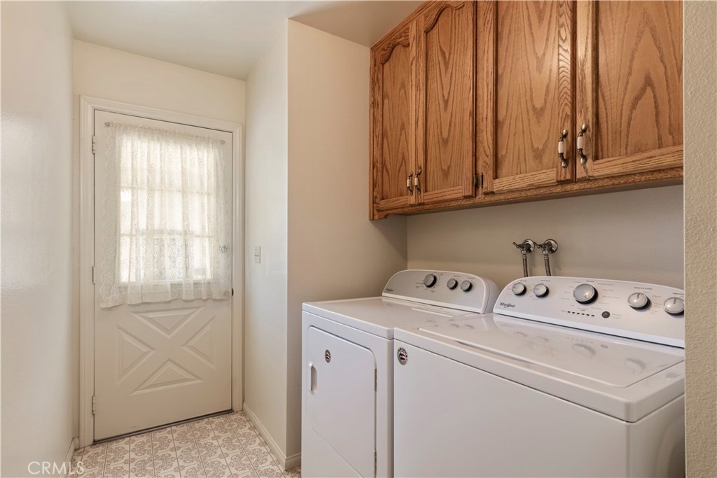 1775 Southfork Place Paso Robles, CA 93446 - Photo 20 of 36 a utility room with dryer and washer