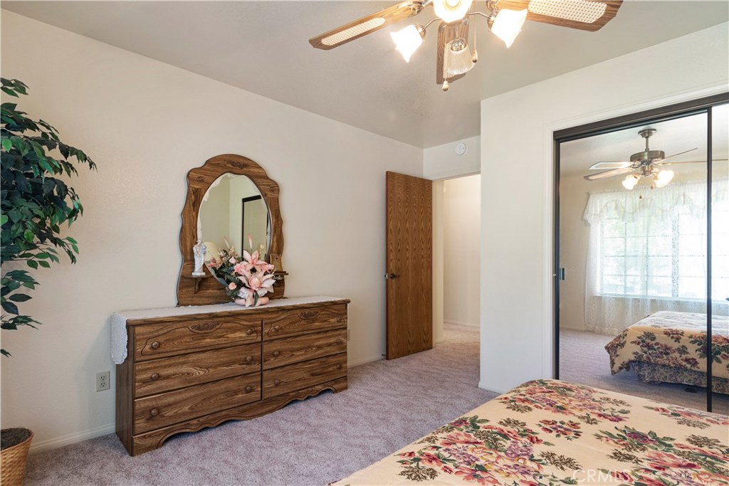 1775 Southfork Place Paso Robles, CA 93446 - Photo 23 of 36 a bedroom with a bed and a dresser