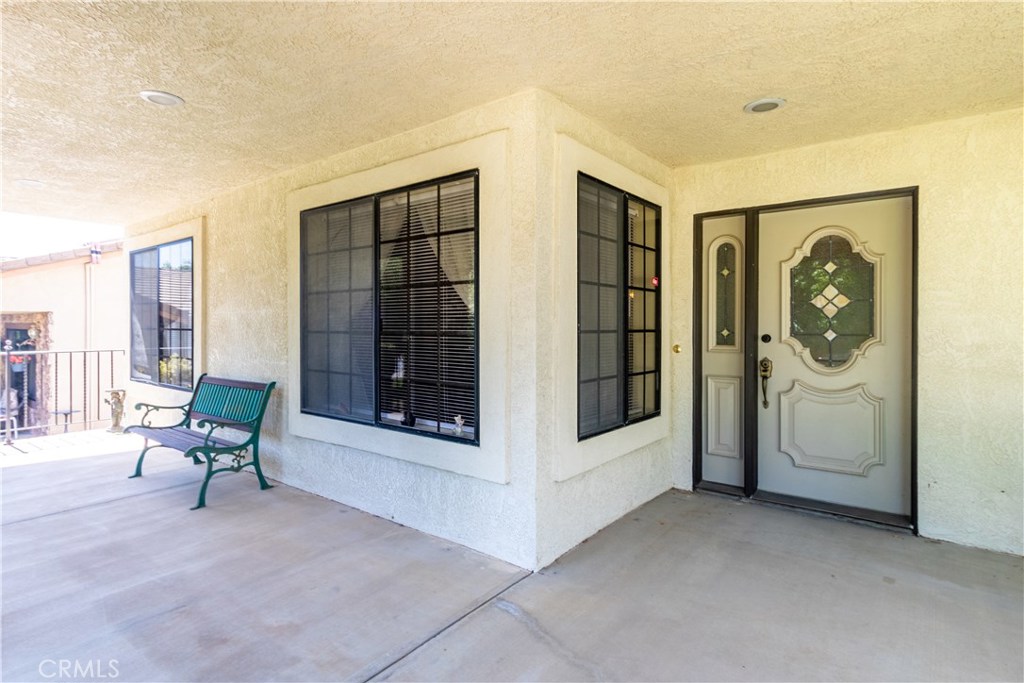 1775 Southfork Place Paso Robles, CA 93446 - Photo 6 of 36 a living room with furniture and a large window