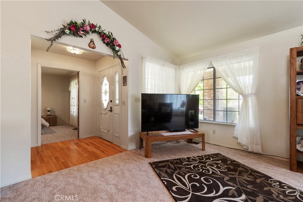 1775 Southfork Place Paso Robles, CA 93446 - Photo 8 of 36 a living room with a flat screen tv and a window