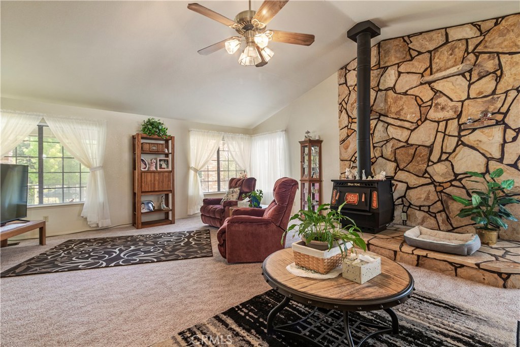 1775 Southfork Place Paso Robles, CA 93446 - Photo 10 of 36 a living room with furniture and a floor to ceiling window