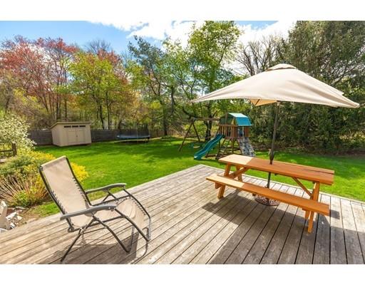 4 Barrett Road Lexington, MA 02421 - Photo 17 of 19 a view of a backyard with a patio