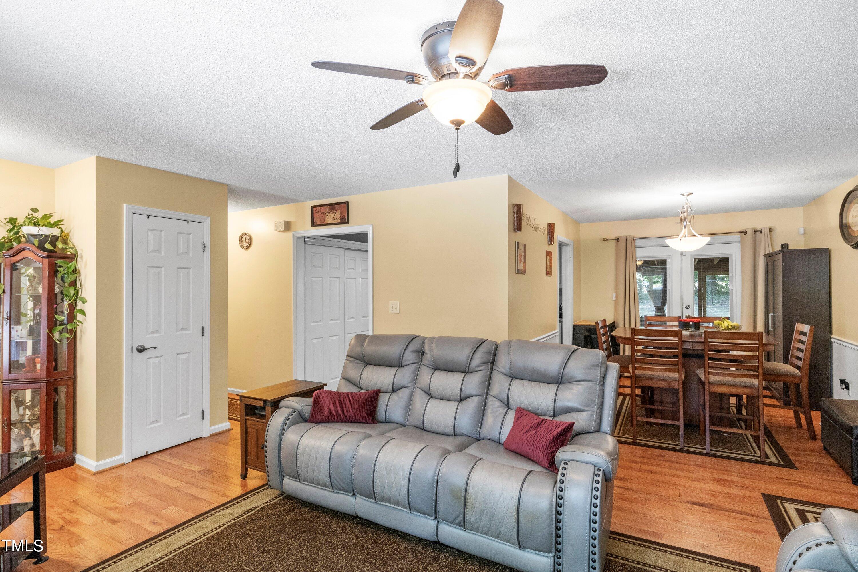 4125 Windsor Place Raleigh, NC 27609 - Photo 15 of 37 a living room with furniture and wooden floor