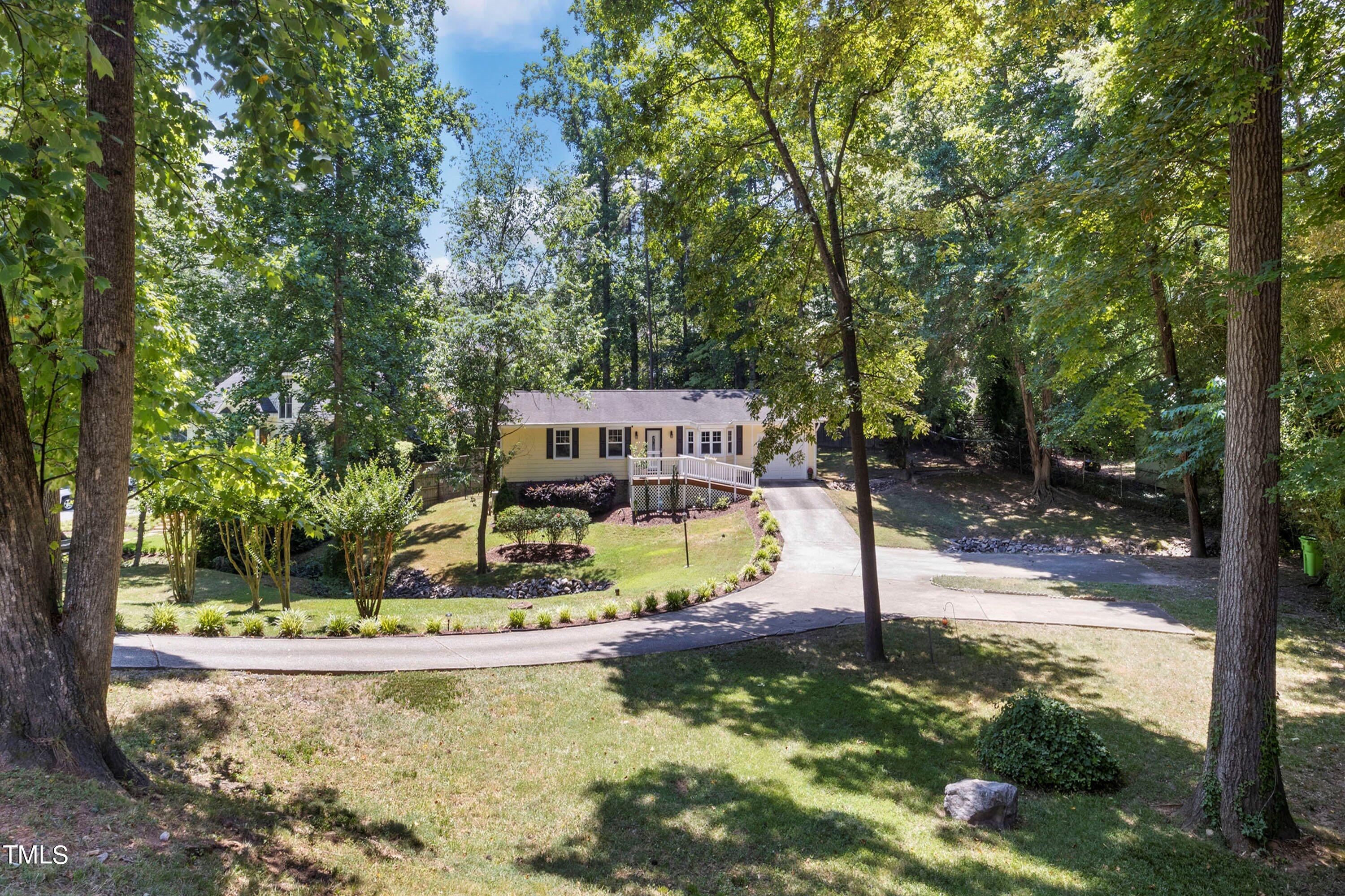 4125 Windsor Place Raleigh, NC 27609 - Photo 2 of 37 a view of a park with large trees