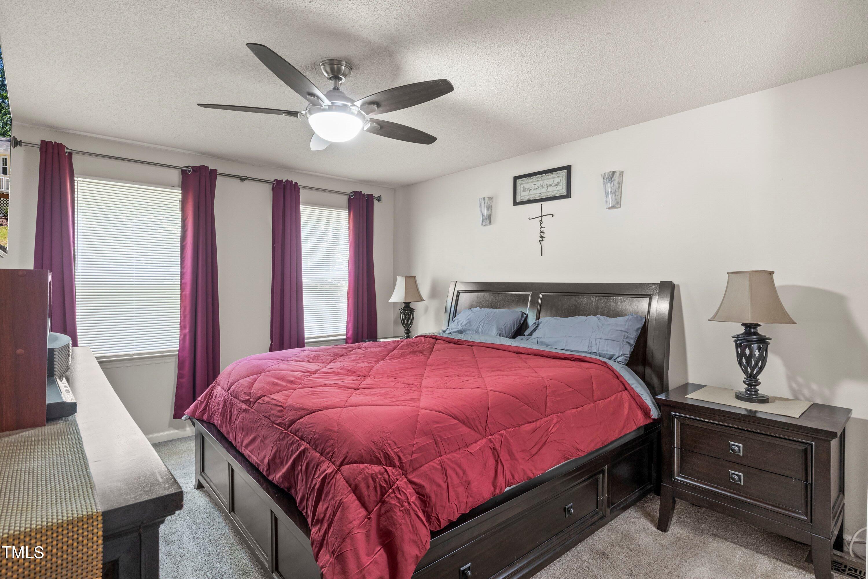 4125 Windsor Place Raleigh, NC 27609 - Photo 28 of 37 a bedroom with a bed and window
