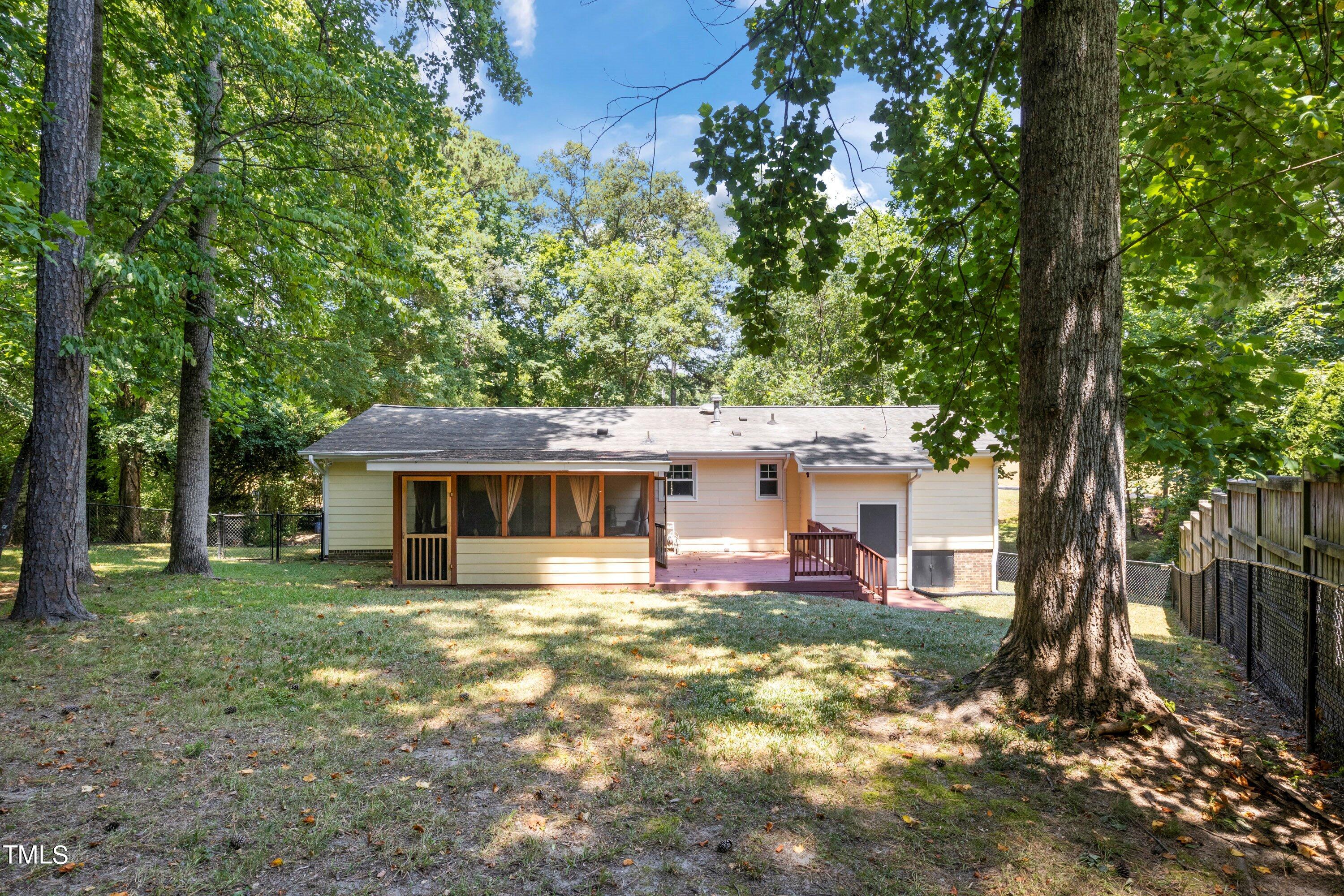 4125 Windsor Place Raleigh, NC 27609 - Photo 34 of 37 front view of a house with a yard