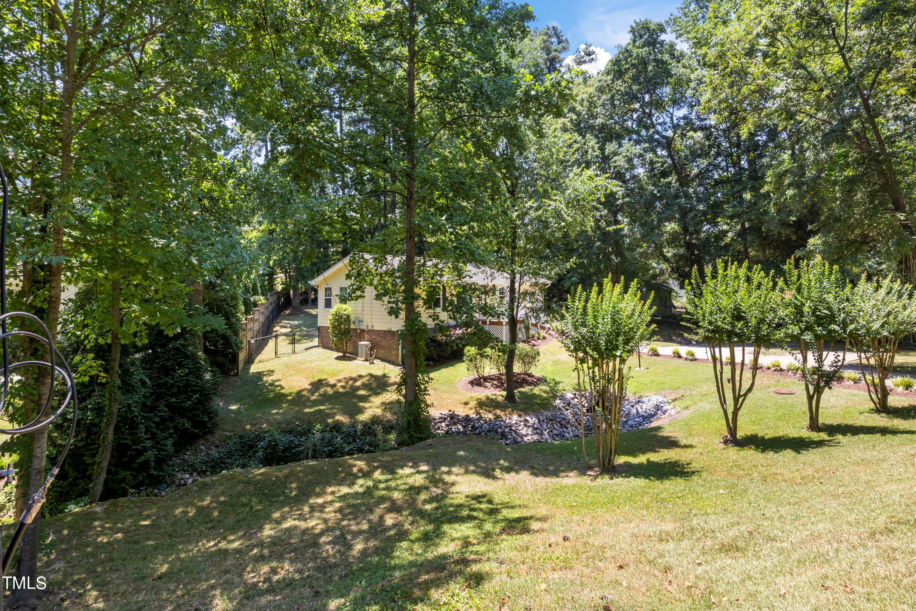 4125 Windsor Place Raleigh, NC 27609 - Photo 4 of 37 a view of yard