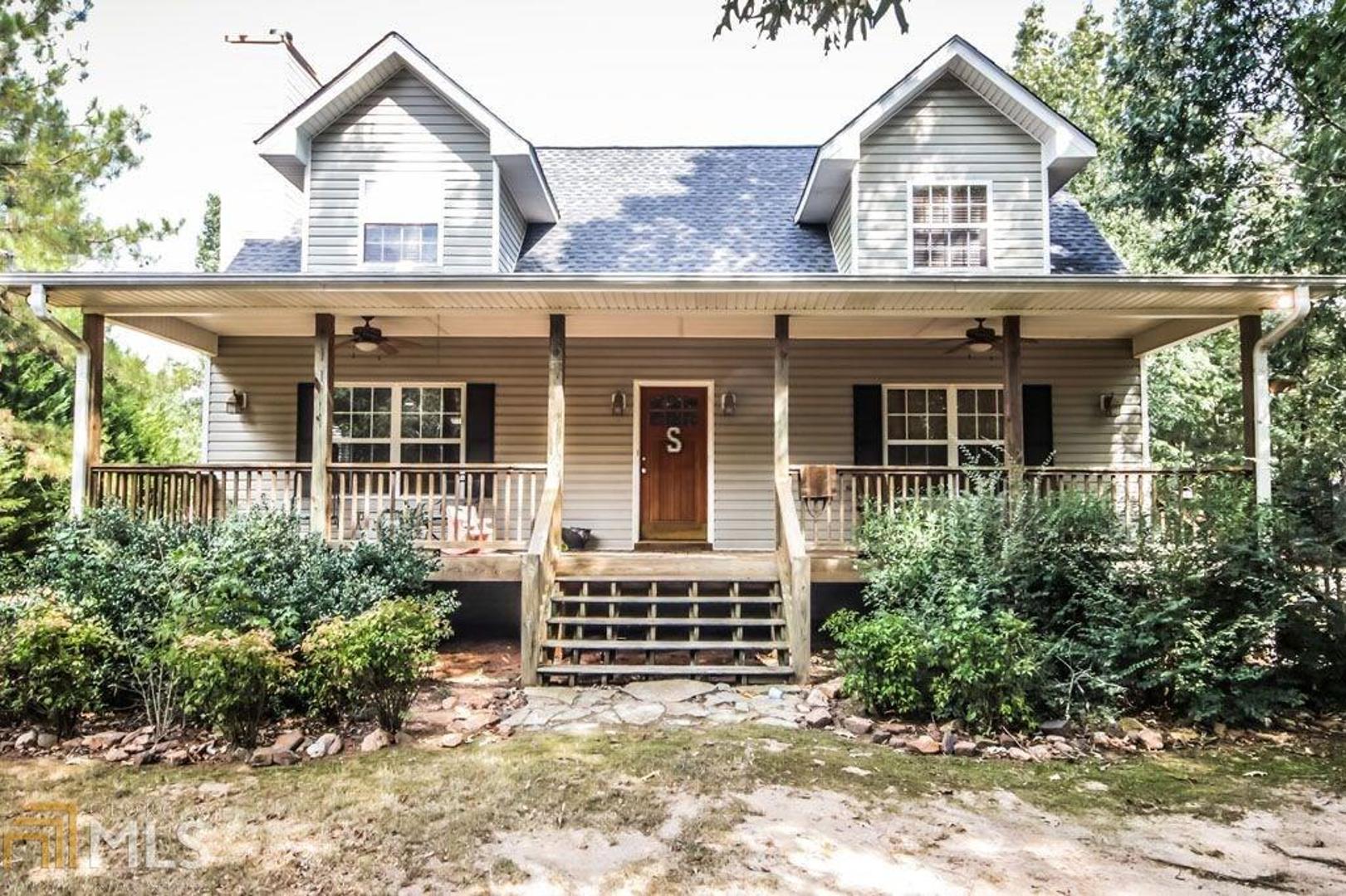 140 Foster Road Jackson, GA 30233 - Photo 1 of 1 front view of a house with a yard