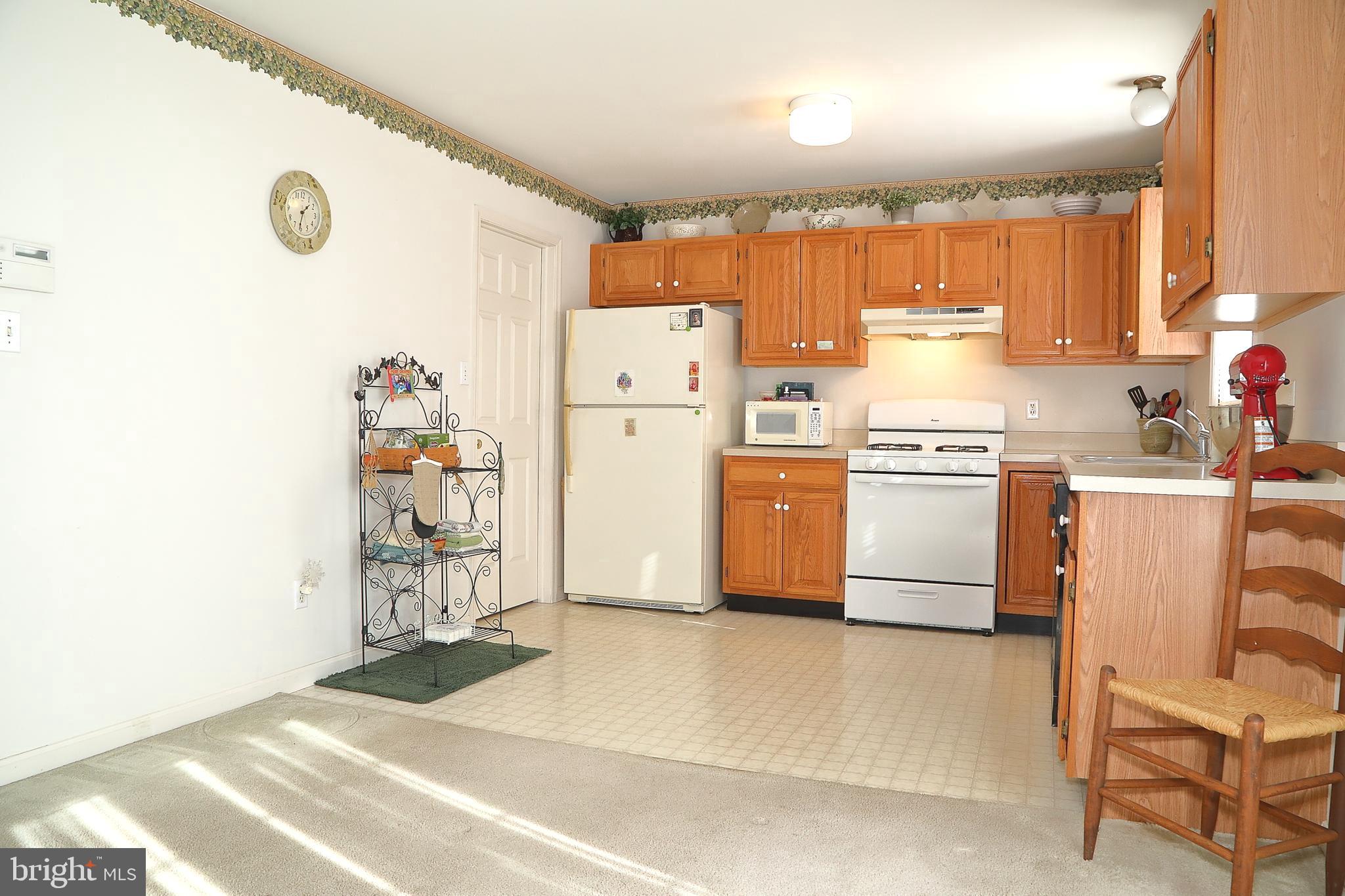 11 Duffield Drive Lititz, PA 17543 - Photo 11 of 22 a utility room with cabinets washer and dryer