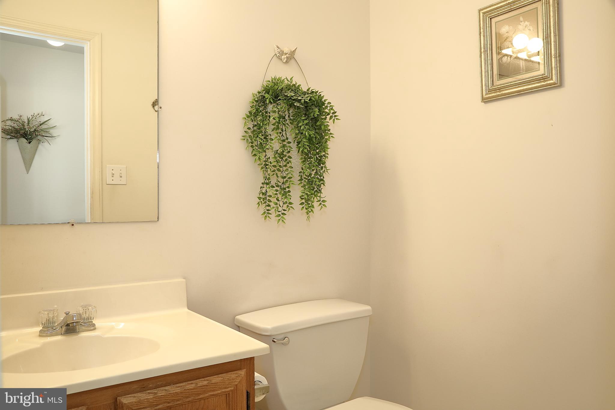 11 Duffield Drive Lititz, PA 17543 - Photo 16 of 22 a bathroom with a sink toilet and vanity