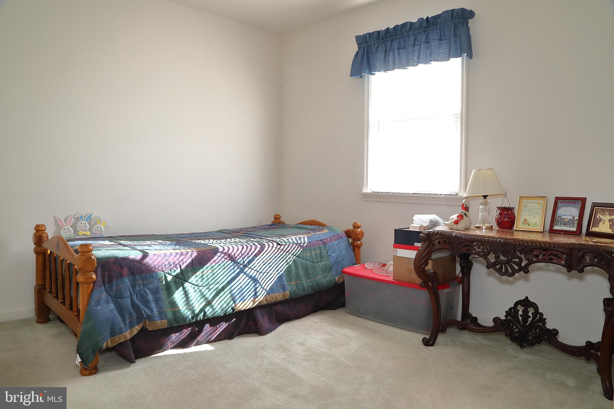 11 Duffield Drive Lititz, PA 17543 - Photo 19 of 22 a bedroom with a bed and a window