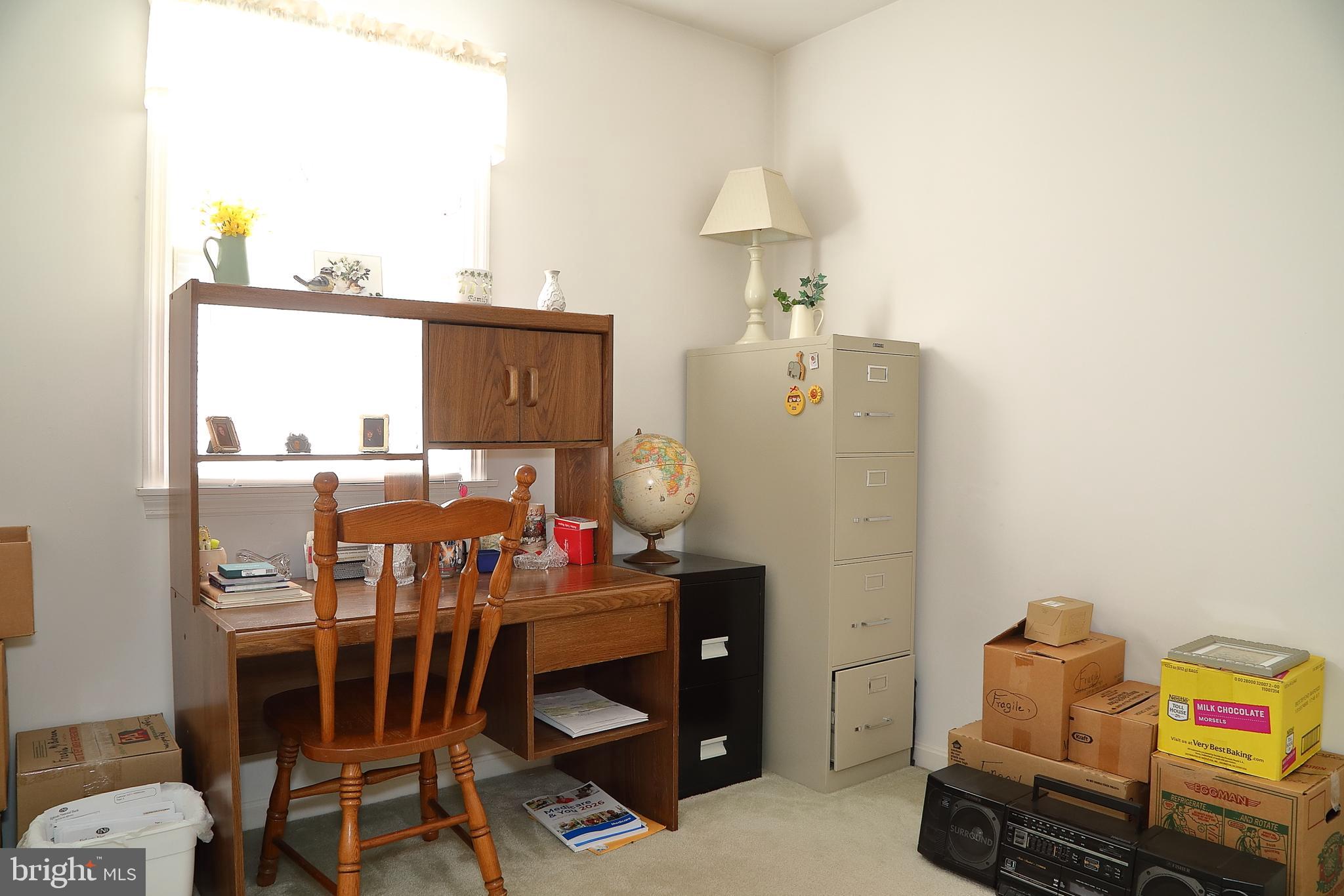 11 Duffield Drive Lititz, PA 17543 - Photo 20 of 22 a bed room with a bed a window and dresser